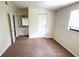 Bedroom featuring carpeted floor and walk-in closet at 4003 Oak Limb Ct, Tampa, FL 33614