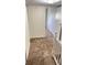 Carpeted hallway with access to rooms at 4003 Oak Limb Ct, Tampa, FL 33614