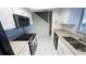 Modern kitchen with stainless appliances and bright countertop at 4003 Oak Limb Ct, Tampa, FL 33614