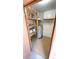 Small utility closet with water heater and shelving at 4003 Oak Limb Ct, Tampa, FL 33614