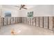 Unfinished bedroom featuring large windows and exposed concrete block at 4210 Huntington Ne St, St Petersburg, FL 33703