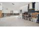 An unfinished kitchen area featuring exposed framing and modern ventilation hood at 4210 Huntington Ne St, St Petersburg, FL 33703