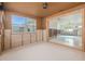 View of the unfinished sunroom, connected to the rest of the home at 4210 Huntington Ne St, St Petersburg, FL 33703