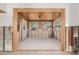 Open frame sunroom with tile floors, multiple windows, and an exterior door at 4210 Huntington Ne St, St Petersburg, FL 33703