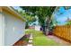 View of the backyard with a storage shed, and a pathway leading to the main house at 4300 16Th N Ave, St Petersburg, FL 33713