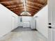 Unfinished basement with wooden ceiling, washer, dryer, and additional appliance at 4300 16Th N Ave, St Petersburg, FL 33713