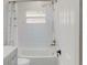 Clean bathroom featuring shower with subway tile, updated fixtures, and a white shower curtain at 4300 16Th N Ave, St Petersburg, FL 33713
