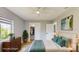 Staged bedroom features modern window, closet, and decor for a stylish and functional living space at 4300 16Th N Ave, St Petersburg, FL 33713