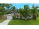 Charming single-story home with a well-maintained lawn and mature trees in a desirable neighborhood at 4300 16Th N Ave, St Petersburg, FL 33713