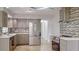 Modern kitchen featuring stainless steel appliances, sleek cabinetry, and updated backsplash at 4300 16Th N Ave, St Petersburg, FL 33713
