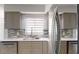 Stylish kitchen featuring stainless steel appliances, quartz countertops, and modern backsplash at 4300 16Th N Ave, St Petersburg, FL 33713