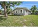Single-story home with a carport and fenced yard at 4570 Essex Ln, Spring Hill, FL 34606