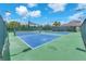 Community features tennis courts for active lifestyles and recreational enjoyment at 4902 Grist Mill Ct, Wimauma, FL 33598