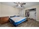 A bedroom featuring a ceiling fan, closet, and a chest of drawers at 4906 Presidential St, Seffner, FL 33584