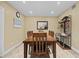Cozy dining room with modern decor and a wooden table set for six at 4906 Presidential St, Seffner, FL 33584