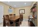 Dining room featuring a wooden table, chair set, and modern decor at 4906 Presidential St, Seffner, FL 33584