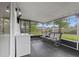 This screened-in patio is perfect for enjoying the outdoors in comfort at 4906 Presidential St, Seffner, FL 33584