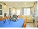 Cozy dining room featuring hardwood table, decor and windows at 5248 Antigua Dr, Zephyrhills, FL 33541