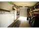 Functional garage space equipped with washer, dryer, and storage cabinets at 5248 Antigua Dr, Zephyrhills, FL 33541