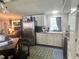 Eat-in kitchen with stainless steel appliances and wood-look countertops at 5248 Antigua Dr, Zephyrhills, FL 33541