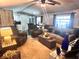 Inviting living room showcasing seating arrangement, and decor at 5248 Antigua Dr, Zephyrhills, FL 33541