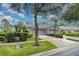 Charming home with a three-car garage, mature landscaping, and well-maintained lawn at 5814 Heronpark Pl, Lithia, FL 33547