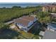 An aerial view of a light gray two-story home near Tampa Bay at 6602 S Sherrill St, Tampa, FL 33616