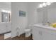 Bright bathroom boasts dual sinks, quartz counters, and modern fixtures at 6602 S Sherrill St, Tampa, FL 33616