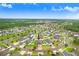 Wide aerial view of the neighborhood and surrounding area, showcasing the home's location at 6620 Paden Wheel St, Zephyrhills, FL 33541