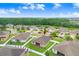 Aerial view of the home showcasing the fenced yard and patio space at 6620 Paden Wheel St, Zephyrhills, FL 33541