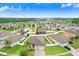 Aerial view of the neighborhood, highlighting the well-maintained yards and multiple homes at 6620 Paden Wheel St, Zephyrhills, FL 33541