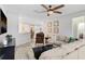 Comfortable living room featuring neutral decor and an open layout at 6620 Paden Wheel St, Zephyrhills, FL 33541