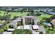 Beautiful aerial view of the condo complex, golf course, lake and the surrounding landscape at 700 Starkey Rd # 311, Largo, FL 33771