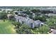 Scenic aerial view of condo complex with surrounding lush greenery and residences at 700 Starkey Rd # 311, Largo, FL 33771