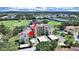 Beautiful aerial view of the condo complex, golf course, lake and the surrounding landscape at 700 Starkey Rd # 311, Largo, FL 33771