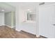 Charming bar area with ample storage and counter space adjacent to the living area at 700 Starkey Rd # 311, Largo, FL 33771