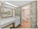 Bathroom features dual sinks, plenty of counter space, and natural lighting at 700 Starkey Rd # 311, Largo, FL 33771