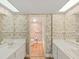 Bathroom features dual sinks, plenty of counter space, and natural lighting at 700 Starkey Rd # 311, Largo, FL 33771