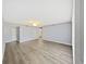 Large bedroom with hard surface flooring and large closet, and natural lighting at 700 Starkey Rd # 311, Largo, FL 33771