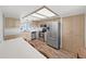 Modern kitchen with stainless steel appliances, light wood cabinets, and wood flooring at 700 Starkey Rd # 311, Largo, FL 33771