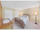 Spacious main bedroom with two closets, large bed, and lamp at 700 Starkey Rd # 311, Largo, FL 33771