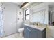 Bathroom featuring a single sink vanity, updated fixtures, and a shower with a curtain at 7018 Arbor View Ln, New Port Richey, FL 34653