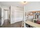 Bedroom features a loft bed, closet, and wood-look floors at 852 Crystal Dr, Palm Harbor, FL 34683