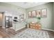 Open kitchen featuring white cabinets, stainless steel appliances, and spacious countertop island at 852 Crystal Dr, Palm Harbor, FL 34683