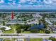 High-angle view of condominium community near a lake, offering picturesque views and a serene atmosphere at 8584 111Th St # 308, Seminole, FL 33772