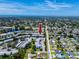 Expansive view from above showing a condominium complex close to the beach with a vibrant community at 8584 111Th St # 308, Seminole, FL 33772