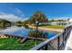 Beautiful view of the lake and community building at 8584 111Th St # 308, Seminole, FL 33772