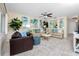 Inviting living room with tiled floors and plenty of seating options at 8584 111Th St # 308, Seminole, FL 33772