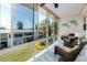 Enclosed sunroom with comfortable seating and a view of the outdoors at 8584 111Th St # 308, Seminole, FL 33772