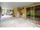 Spacious screened-in patio provides a comfortable outdoor living space, ideal for relaxation and leisure at 8731 Huntfield St, Tampa, FL 33635
